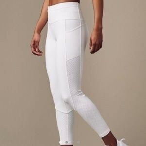 Lululemon white stretch leggings, size 10. Exclusive design and never worn.